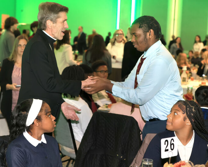 Bishop Koenig, De Sales University President Father James Greenfield encourage Trainor scholars to reach Catholic education dreams