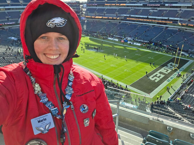 Marie Graney, pastoral services coordinator at St. Ann’s, Wilmington, helps you to your seat at Lincoln Financial Field