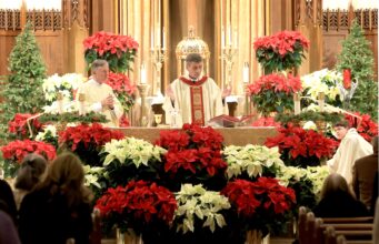 Bishop Koenig celebrates Christmas vigil at St. Ann parish in Wilmington — Photo gallery