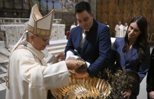 Baptism provides light in darkness, gateway to heaven, Pope Leo XIV says as he christens 20 infants in Vatican City