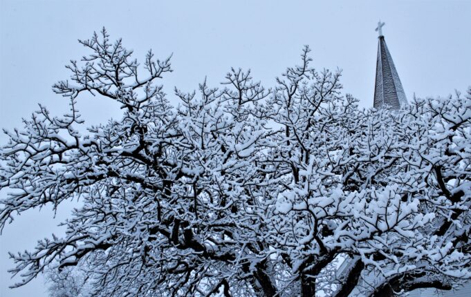 Megastorm predicted for Sunday could create mayhem for local parishes; kids will be watching for Monday school news