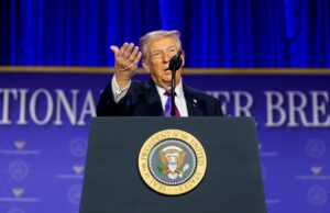 President Donald Trump defends Homeland Security chief Kristi Noem after Minneapolis immigration raids draw scrutiny