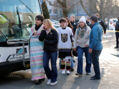 Three dead in targeted shooting at Rhode Island hockey game involving Catholic school co-op