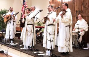 Hillbilly Thomists present a winning combination — theology, folk and bluegrass — during Diocese of Wilmington performance