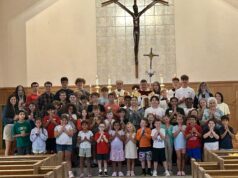 Youngsters get part of their religious education studies completed during camp at St. Matthew in Wilmington — Photo gallery