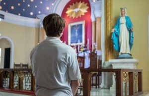 What draws young people to the Catholic Church and keeps them there?
