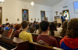 Aquinas Academy welcomes representative from College of St. Joseph the Worker