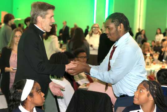 Bishop Koenig, De Sales University President Father James Greenfield encourage Trainor scholars to reach Catholic education dreams