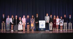 Saints Peter and Paul High School in Easton, Maryland, welcomes nine new members at National Honor Society induction
