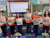 HAPPY CATHOLIC SCHOOLS WEEK: St. Anthony of Padua second-grade students celebrate with their photo on the cover of this week’s Dialog