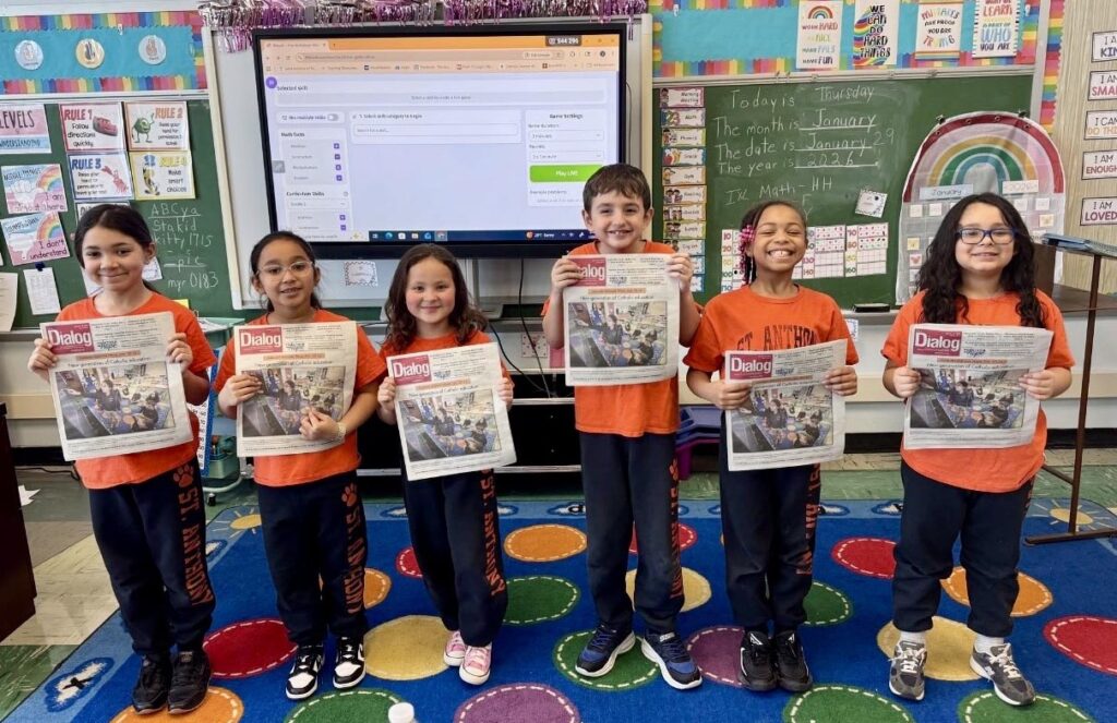 HAPPY CATHOLIC SCHOOLS WEEK: St. Anthony of Padua second-grade students celebrate with their photo on the cover of this week’s Dialog