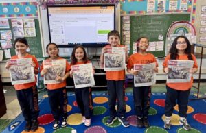 HAPPY CATHOLIC SCHOOLS WEEK: St. Anthony of Padua second-grade students celebrate with their photo on the cover of this week’s Dialog
