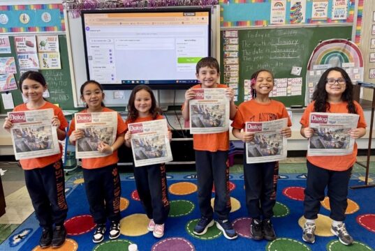 HAPPY CATHOLIC SCHOOLS WEEK: St. Anthony of Padua second-grade students celebrate with their photo on the cover of this week’s Dialog