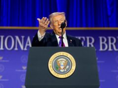 President Donald Trump defends Homeland Security chief Kristi Noem after Minneapolis immigration raids draw scrutiny