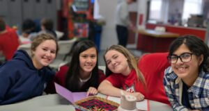 Aquinas Academy students spend cold days of Catholic Schools Week helping to warm hearts at Jeanne Jugan Residence — Photo gallery