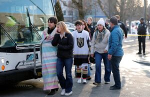 Three dead in targeted shooting at Rhode Island hockey game involving Catholic school co-op
