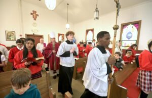 Bishop Koenig celebrates Mass during annual visit to Aquinas Academy in Bear