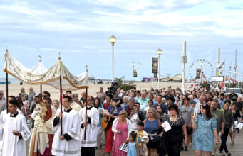 Walking with faith: National Eucharistic Pilgrimage greets the morning on Ocean City boardwalk — Photo gallery