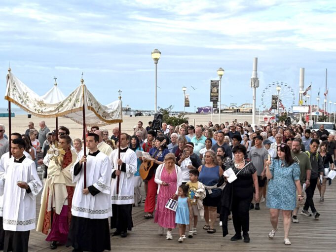 Walking with faith: National Eucharistic Pilgrimage greets the morning on Ocean City boardwalk — Photo gallery