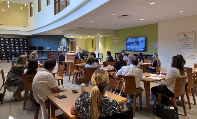 Leaders from Catholic schools across the region join in discussion aimed at growing advancement efforts