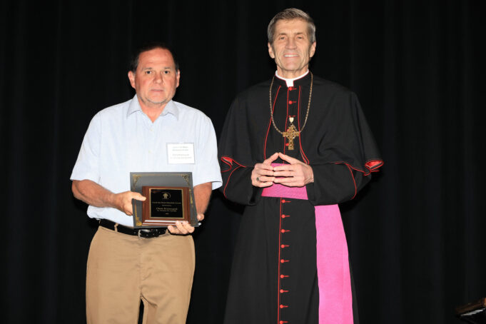 Catholic Youth Ministry honors longtime coach, referee Chris Krawczyk with Jim Blunt Memorial Award