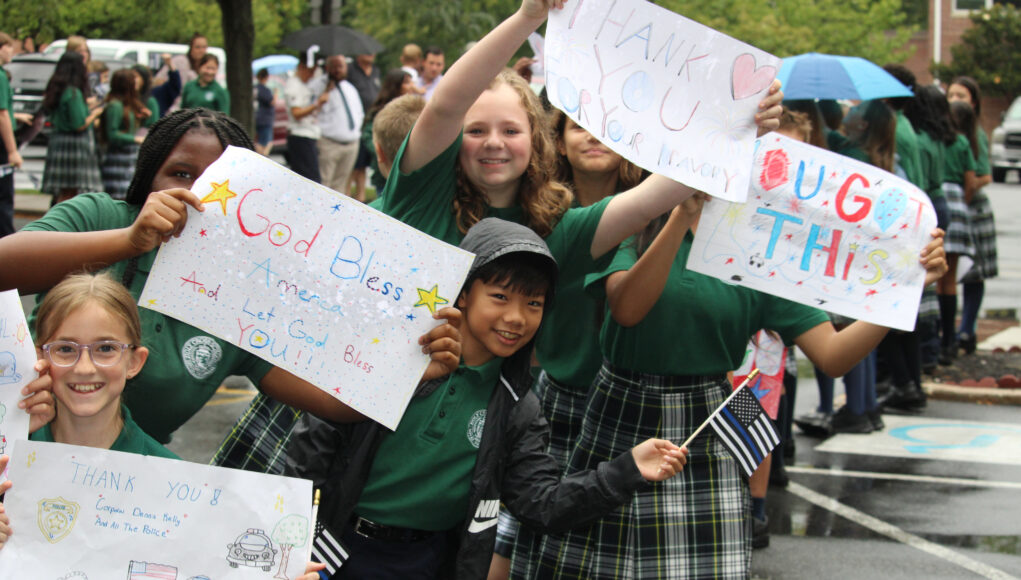 Delaware ‘thank you ride’ done for and by first responders lights up a solemn day for Dover school children at Holy Cross School